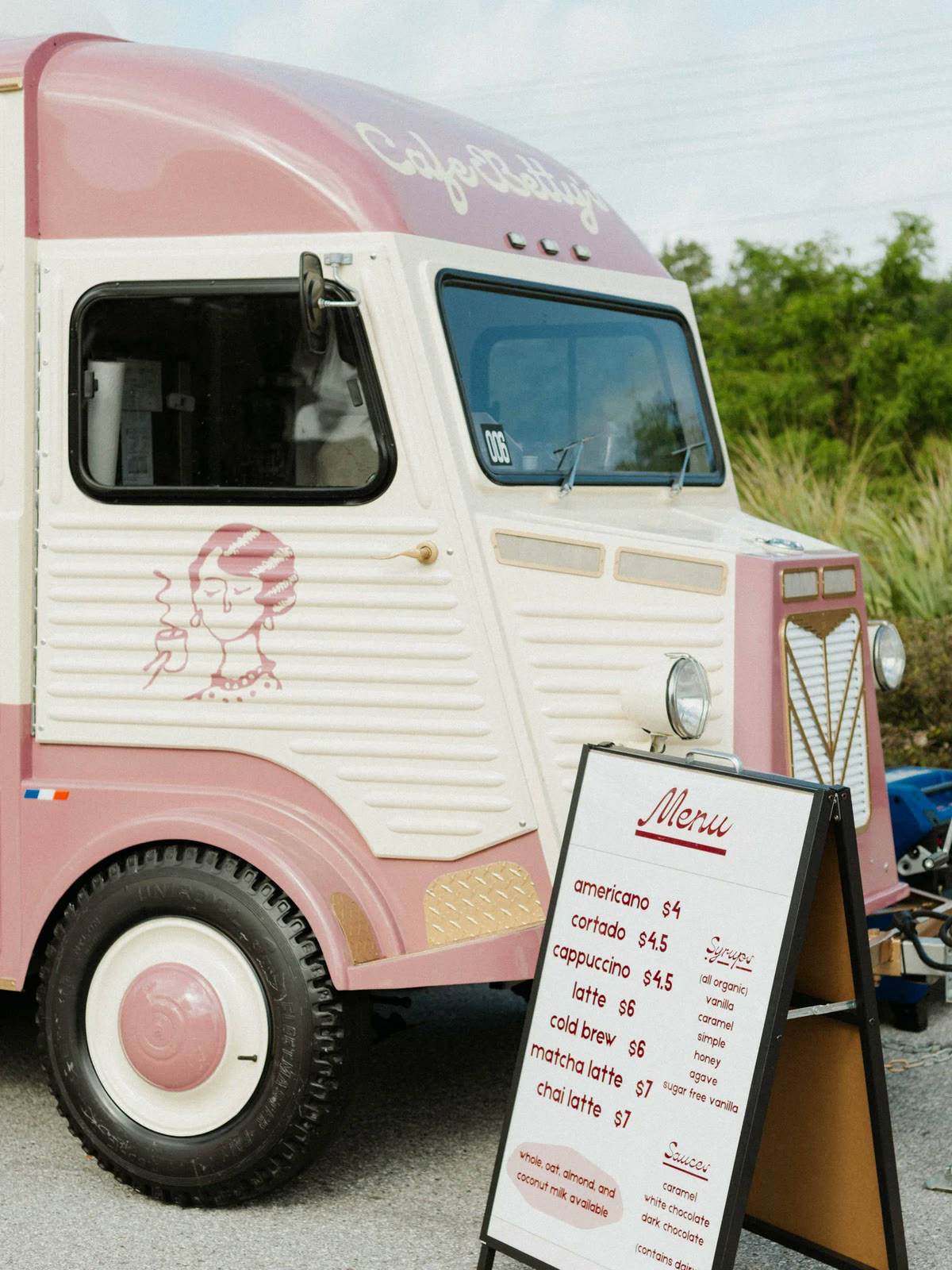 The Cafe Betty's trailer with its A-frame menu board